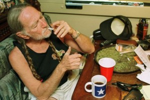 Willie-Nelson-takes-a-drag-off-a-joint-while-relaxing-at-his-home-in-Texas-2000s